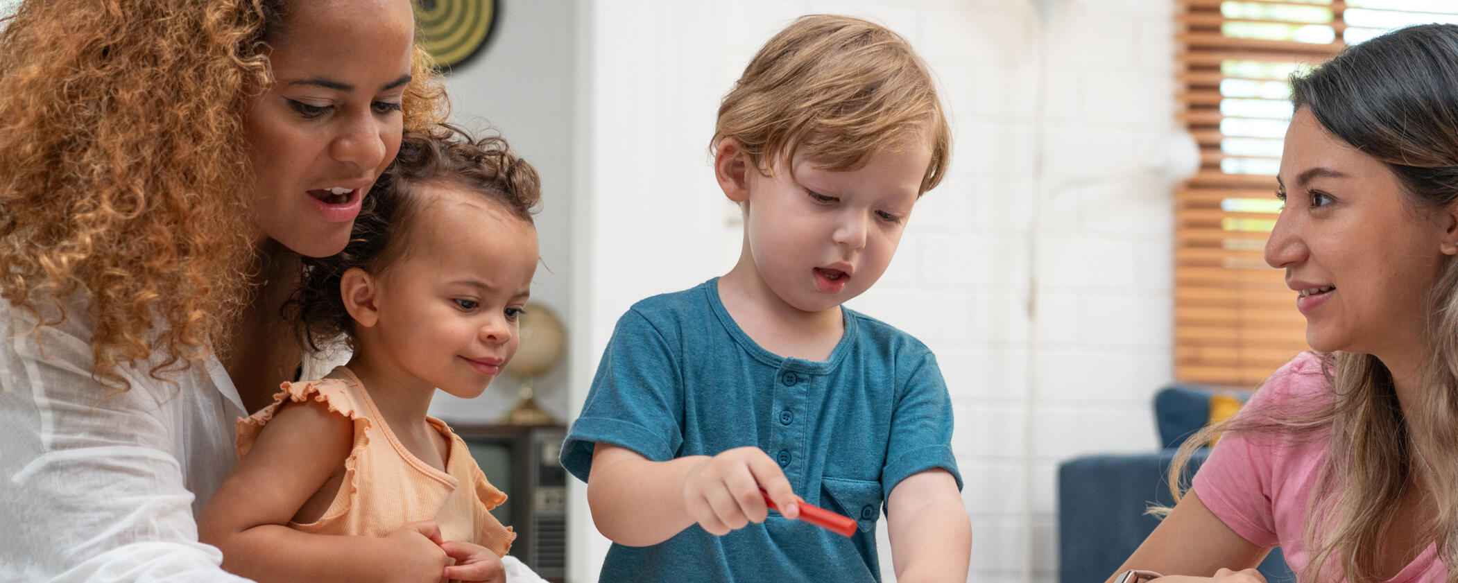 Take the Survey Teachers in class with toddlers learning