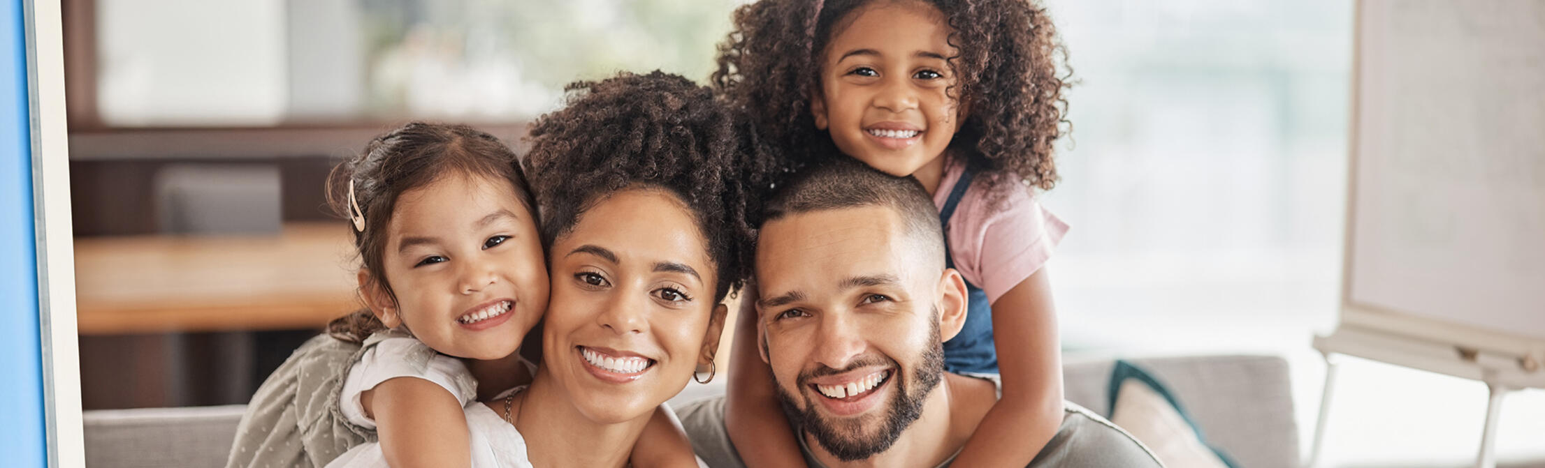 Multi-cultural family smiling